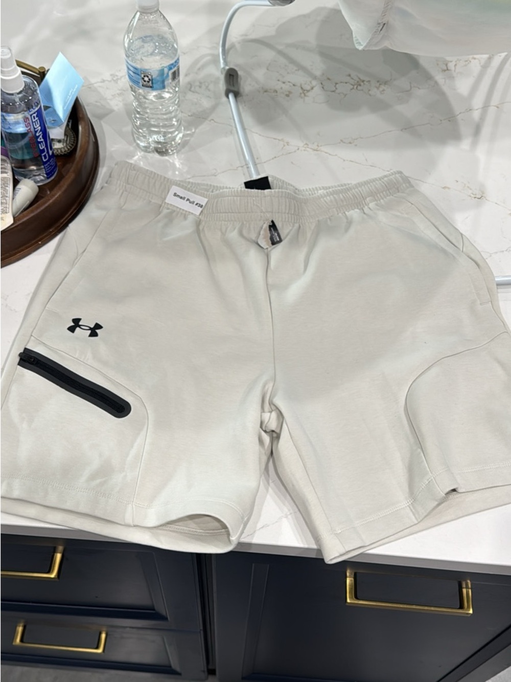 Under Armour Men's Light Beige Athletic Shorts with Black Accent